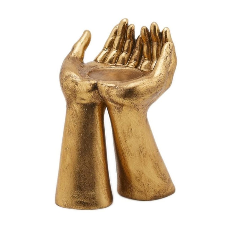 Portacandela con mani dorato